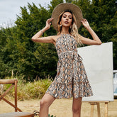 Vestido con volantes y estampado de serpiente